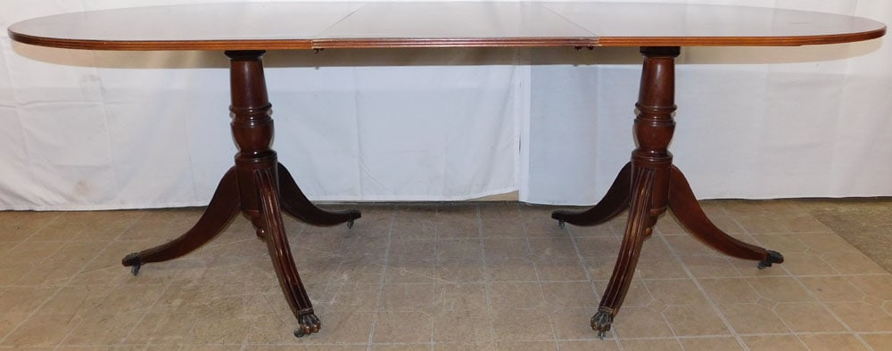 Mahogany Two Pedestal Banded Top Dining Table with One Leaf: Mahogany Two Pedestal Banded Top Dining Table with One Leaf . 30" H 84 1/2" L 39 1/4" D ALL DESCRIPTIONS AND ANY CONDITION STATEMENT GIVEN BY LANGSTON AUCTION GALLERY ARE STRICTLY OPINIONS AND