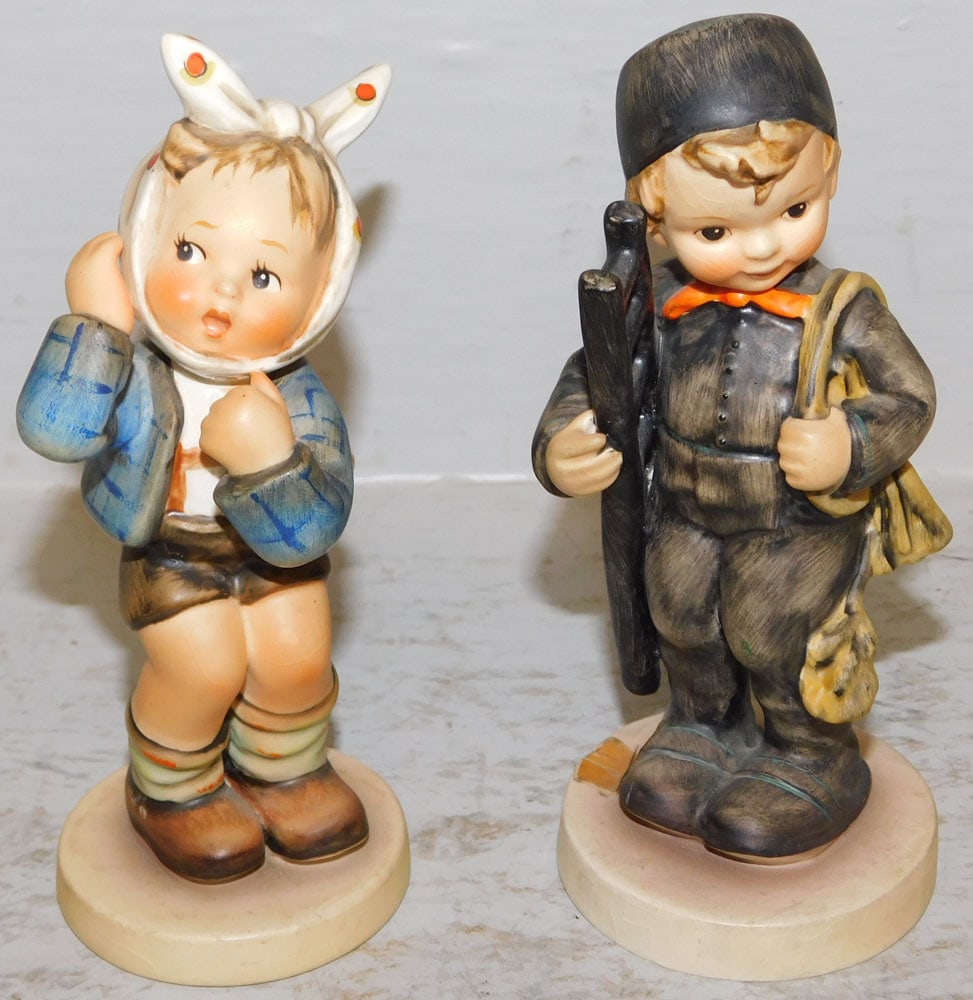 Two Hummel Figurines: Two Hummel Figurines. Up to 6 3/4" H ALL DESCRIPTIONS AND ANY CONDITION STATEMENT GIVEN BY LANGSTON AUCTION GALLERY ARE STRICTLY OPINIONS AND LANGSTON'S SHALL HAVE NO RESPONSIBILITY FOR ERRORS OR OMIS
