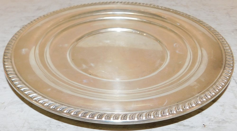 Sterling Plate by Alvin, 4.98 ozt.: Sterling Plate by Alvin, 4.98 ozt.. 9" Dia. ALL DESCRIPTIONS AND ANY CONDITION STATEMENT GIVEN BY LANGSTON AUCTION GALLERY ARE STRICTLY OPINIONS AND LANGSTON'S SHALL HAVE NO RESPONSIBILITY FOR ERRORS 