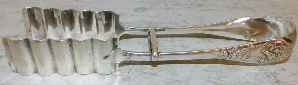 Antique 800 Silver Asparagus Tongs, 4.82 ozt.: Antique 800 Silver Asparagus Tongs, 4.82 ozt.. 8 1/2" L ALL DESCRIPTIONS AND ANY CONDITION STATEMENT GIVEN BY LANGSTON AUCTION GALLERY ARE STRICTLY OPINIONS AND LANGSTON'S SHALL HAVE NO