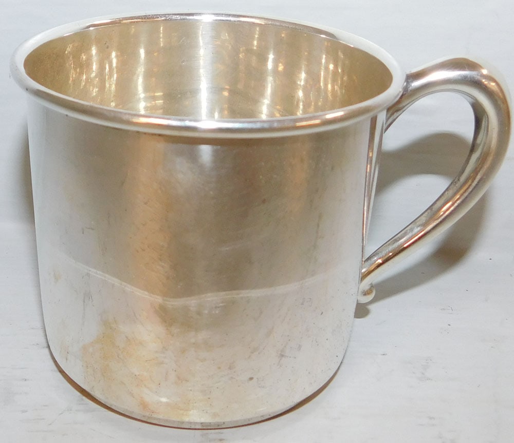 Sterling Cup, 2.97 ozt.: Sterling Cup, 2.97 ozt.. 2 1/2" H 3 3/4" W ALL DESCRIPTIONS AND ANY CONDITION STATEMENT GIVEN BY LANGSTON AUCTION GALLERY ARE STRICTLY OPINIONS AND LANGSTON'S SHALL HAVE NO RESPONSIBILITY FOR ERRORS O