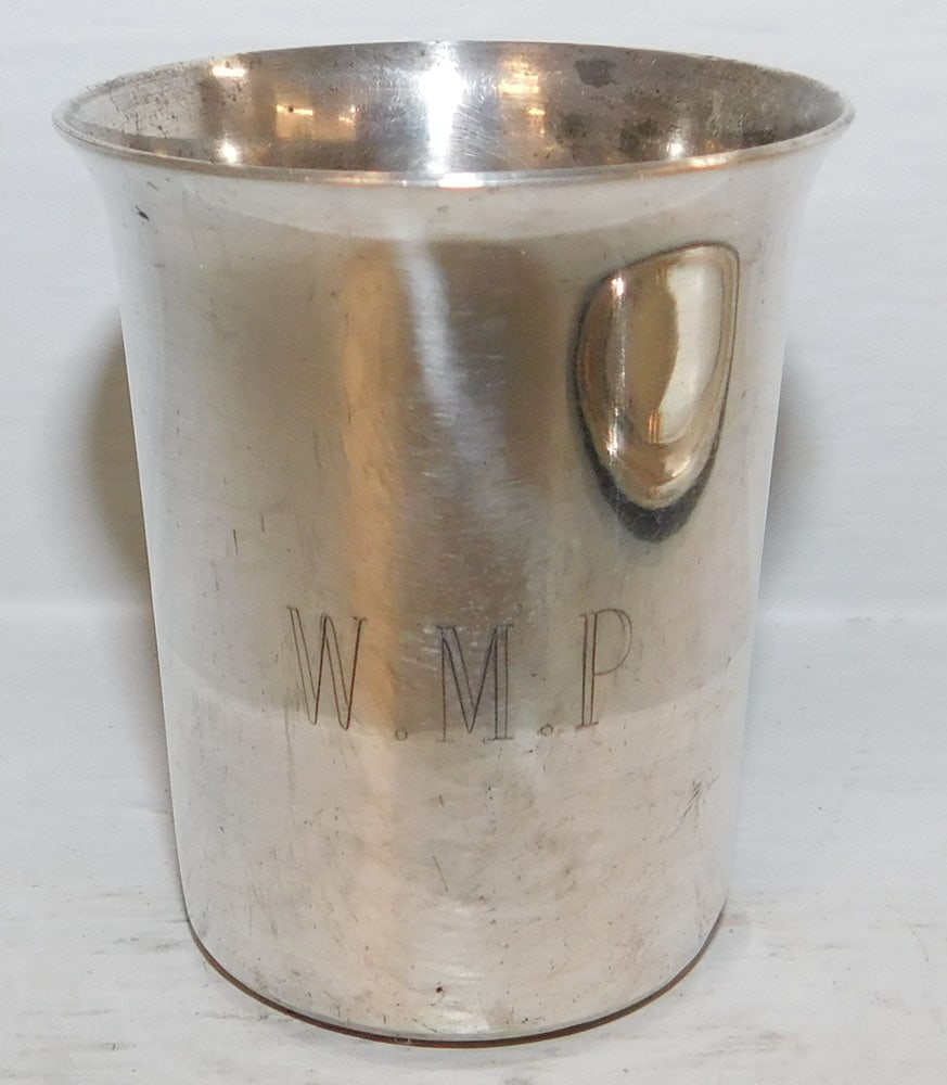 Sterling Shot Glass, 1.28 ozt.: Sterling Shot Glass, 1.28 ozt.. 2" H 1 3/4" Dia ALL DESCRIPTIONS AND ANY CONDITION STATEMENT GIVEN BY LANGSTON AUCTION GALLERY ARE STRICTLY OPINIONS AND LANGSTON'S SHALL HAVE NO RESPONSIBILITY FOR