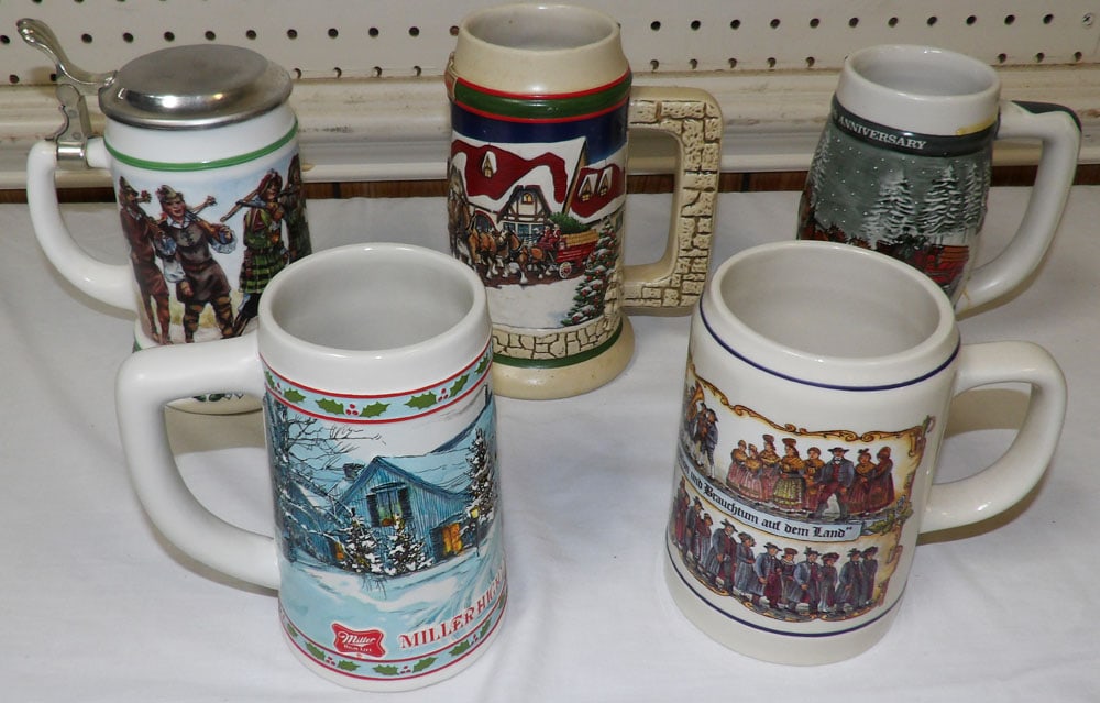 Lot of Porcelain & Milk Glass Steins with Pewter Tops: Lot of Porcelain & Milk Glass Steins with Pewter Tops. Up to 7" H 5 1/2" W "ALL DESCRIPTIONS AND ANY CONDITION STATEMENT GIVEN BY LANGSTON AUCTION GALLERY ARE STRICTLY OPINIONS AND LANGSTON'S SHALL