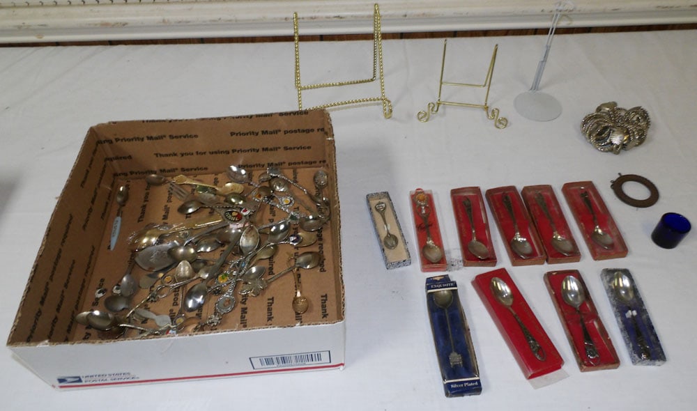 Lot of Souvenir Spoons: Lot of Souvenir Spoons . Up to 6" H 5 1/2" W "ALL DESCRIPTIONS AND ANY CONDITION STATEMENT GIVEN BY LANGSTON AUCTION GALLERY ARE STRICTLY OPINIONS AND LANGSTON'S SHALL HAVE NO RESPONSIBILITY FOR