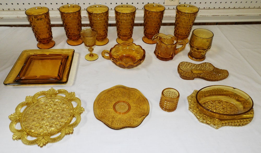 Lot of Amber Glass Items: Lot of Amber Glass Items . Up to 8" Dia. "ALL DESCRIPTIONS AND ANY CONDITION STATEMENT GIVEN BY LANGSTON AUCTION GALLERY ARE STRICTLY OPINIONS AND LANGSTON'S SHALL HAVE NO RESPONSIBILITY FOR ERRORS