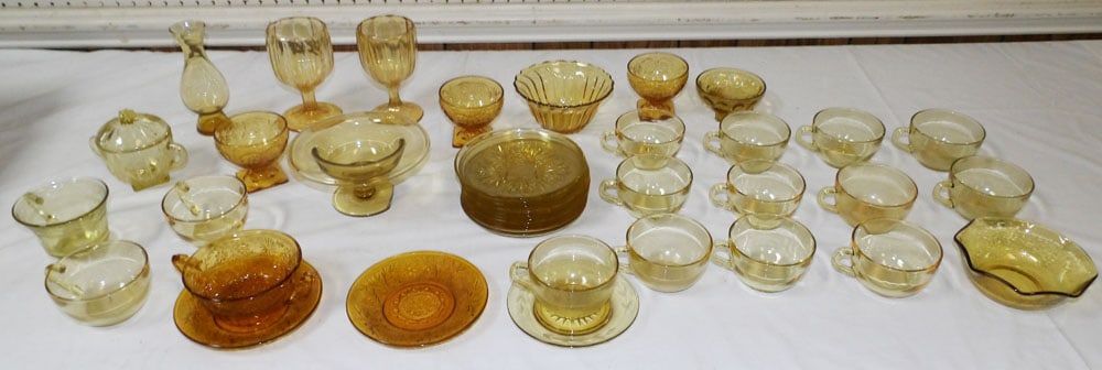 Lot of Amber Glass Items: Lot of Amber Glass Items . Up to 3" H 7" W "ALL DESCRIPTIONS AND ANY CONDITION STATEMENT GIVEN BY LANGSTON AUCTION GALLERY ARE STRICTLY OPINIONS AND LANGSTON'S SHALL HAVE NO RESPONSIBILITY FOR ERRORS
