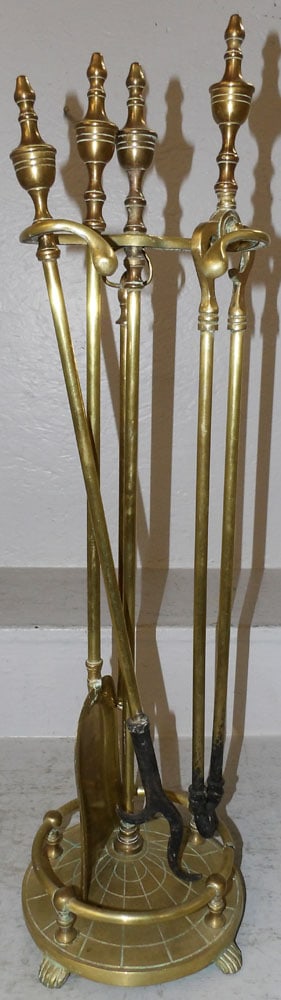 Five Piece Brass Fire Place Tool Set: Five Piece Brass Fire Place Tool Set. 28 1/4" H 8" Dia. "ALL DESCRIPTIONS AND ANY CONDITION STATEMENT GIVEN BY LANGSTON AUCTION GALLERY ARE STRICTLY OPINIONS AND LANGSTON'S SHALL HAVE NO