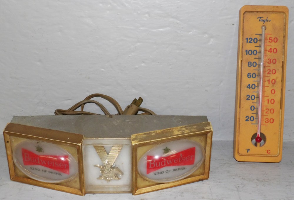 Vintage Electric Budweiser Sign & Taylor Advertising Thermometer: Vintage Electric Budweiser Sign & Taylor Advertising Thermometer. Up to 2 1/2" H 9" W 4" D "ALL DESCRIPTIONS AND ANY CONDITION STATEMENT GIVEN BY LANGSTON AUCTION GALLERY ARE STRICTLY OPINIONS AND