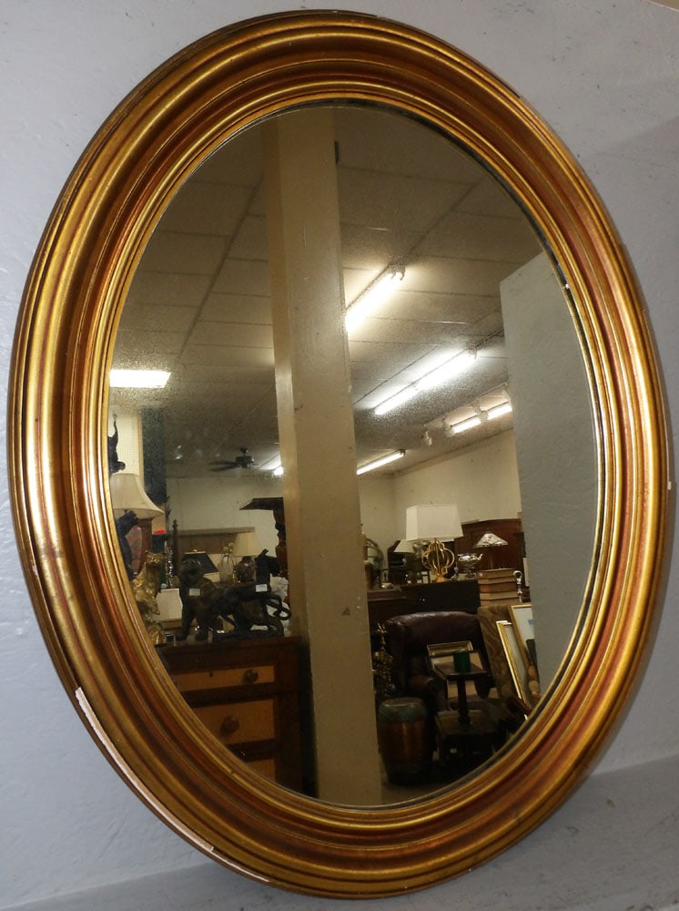 Gilded Frame Oval Mirror: Gilded Frame Oval Mirror. 34" x 27 1/2" "ALL DESCRIPTIONS AND ANY CONDITION STATEMENT GIVEN BY LANGSTON AUCTION GALLERY ARE STRICTLY OPINIONS AND LANGSTON'S SHALL HAVE NO RESPONSIBILITY FOR ERRORS OR