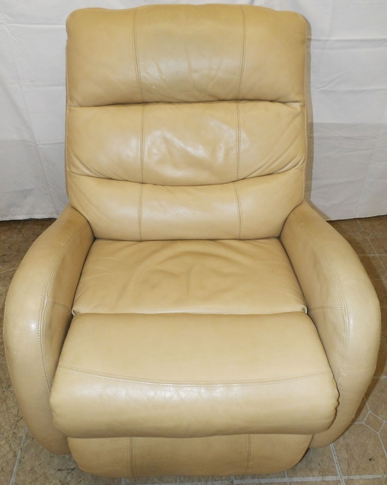 Leather Upholstered Recliner: Leather Upholstered Recliner . 40" H 32" W 41" D "ALL DESCRIPTIONS AND ANY CONDITION STATEMENT GIVEN BY LANGSTON AUCTION GALLERY ARE STRICTLY OPINIONS AND LANGSTON'S SHALL HAVE NO RESPONSIBILITY FOR