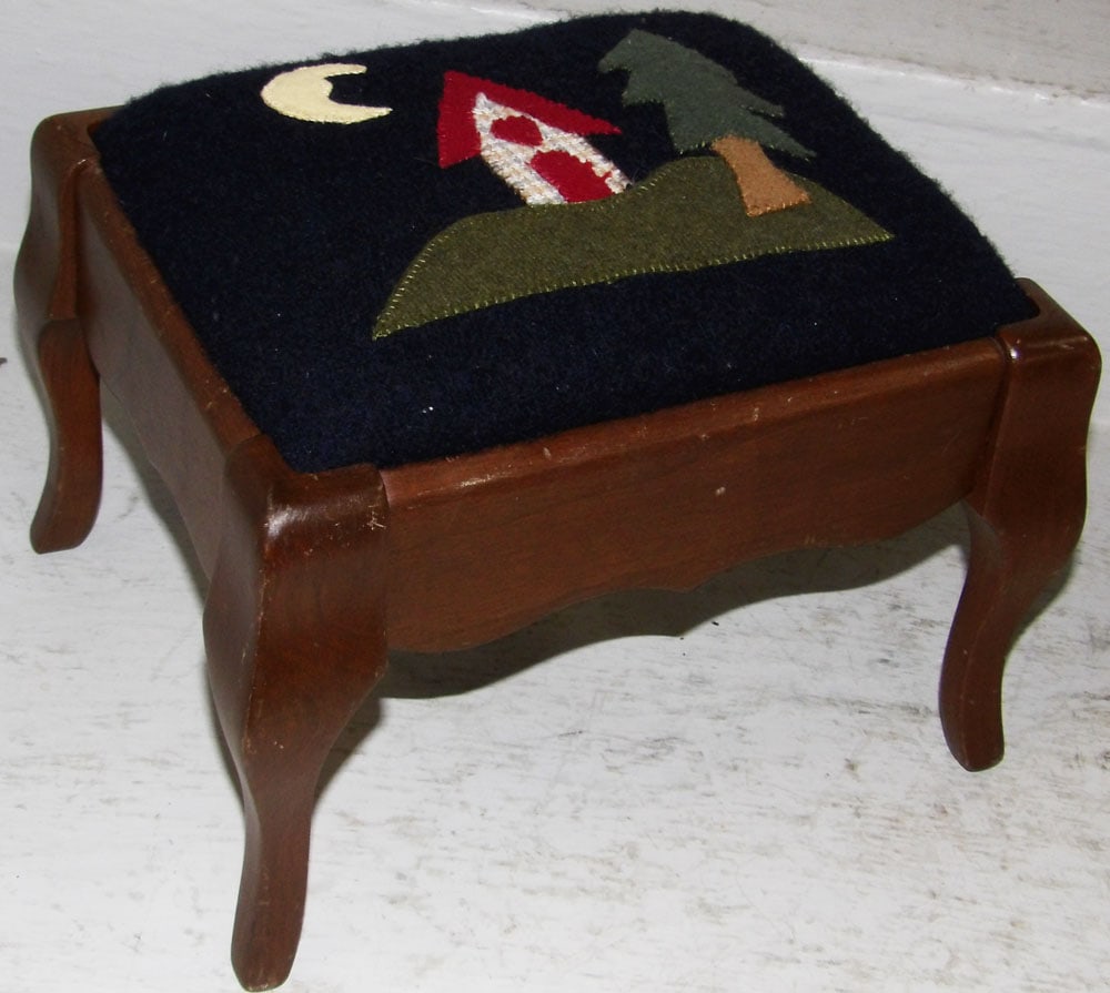 Bench Made Cherry Foot Stool with Folk Art Needlework Top: Bench Made Cherry Foot Stool with Folk Art Needlework Top. 7 1/2" H 11" W 9 1/4" D "ALL DESCRIPTIONS AND ANY CONDITION STATEMENT GIVEN BY LANGSTON AUCTION GALLERY ARE STRICTLY OPINIONS AND LANGSTON'S