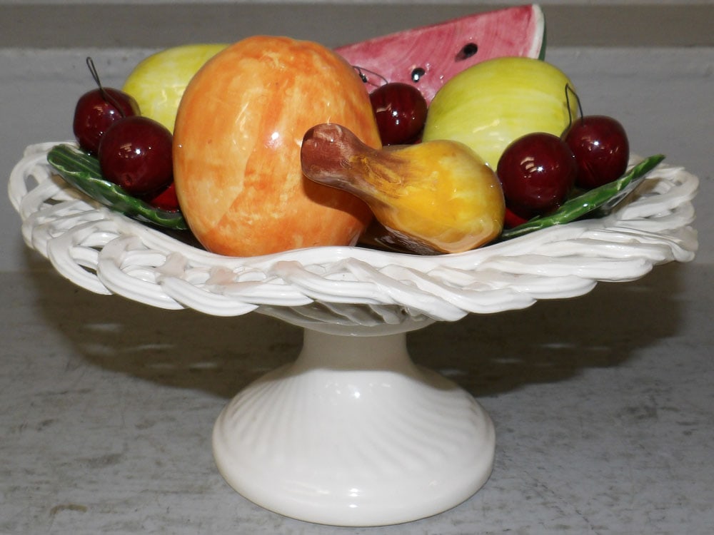 Painted Porcelain Italian Fruit Centerpiece: Painted Porcelain Italian Fruit Centerpiece. 8" H 11" Dia. "ALL DESCRIPTIONS AND ANY CONDITION STATEMENT GIVEN BY LANGSTON AUCTION GALLERY ARE STRICTLY OPINIONS AND LANGSTON'S SHALL HAVE NO