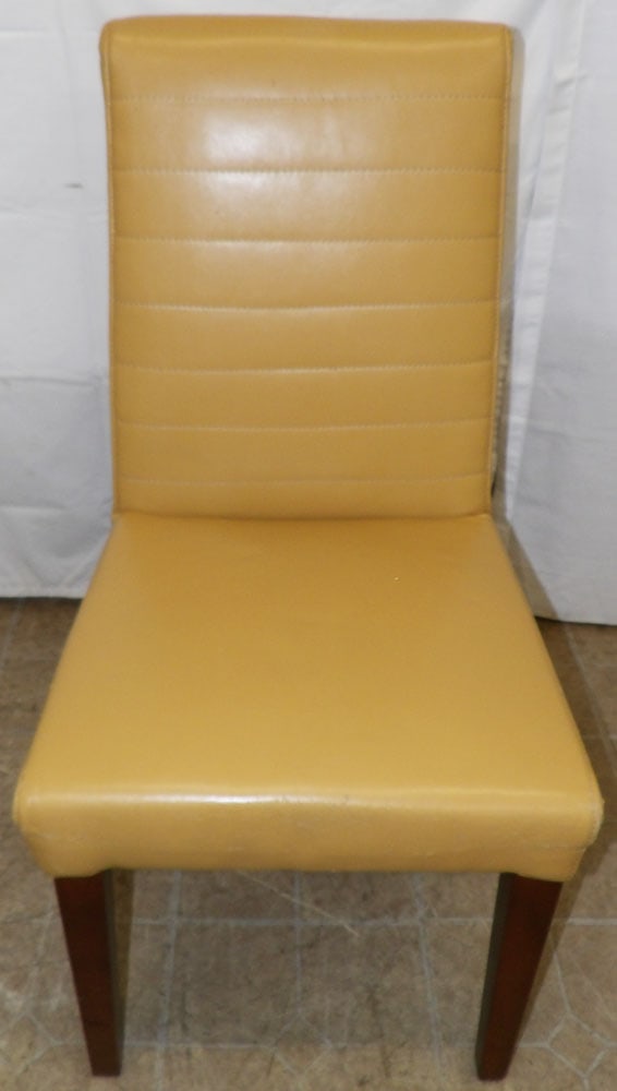 Vinyl Upholstered Side Chair: Vinyl Upholstered Side Chair . 36" H 19" W 22" D "ALL DESCRIPTIONS AND ANY CONDITION STATEMENT GIVEN BY LANGSTON AUCTION GALLERY ARE STRICTLY OPINIONS AND LANGSTON'S SHALL HAVE NO RESPONSIBILITY FOR