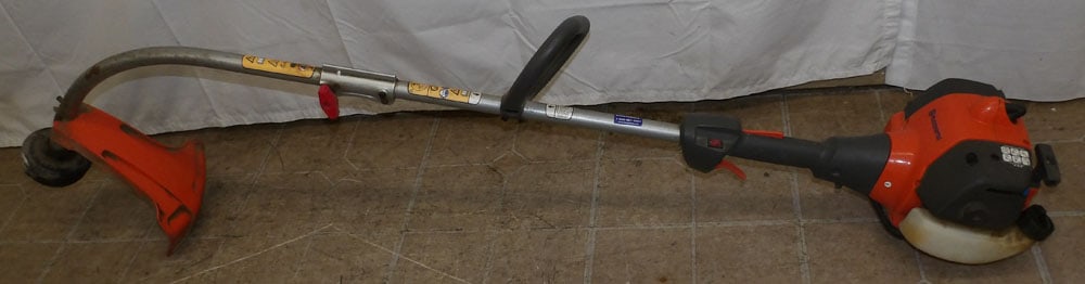 Husqvarna Weed Eater: Husqvarna Weed Eater. 58 1/2" L "ALL DESCRIPTIONS AND ANY CONDITION STATEMENT GIVEN BY LANGSTON AUCTION GALLERY ARE STRICTLY OPINIONS AND LANGSTON'S SHALL HAVE NO RESPONSIBILITY FOR ERRORS OR
