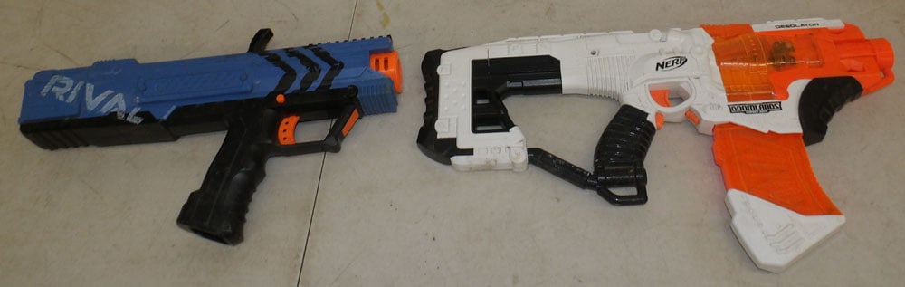 Two Toy Guns: Two Toy Guns. 20" L 10 1/4" W "ALL DESCRIPTIONS AND ANY CONDITION STATEMENT GIVEN BY LANGSTON AUCTION GALLERY ARE STRICTLY OPINIONS AND LANGSTON'S SHALL HAVE NO RESPONSIBILITY FOR ERRORS OR