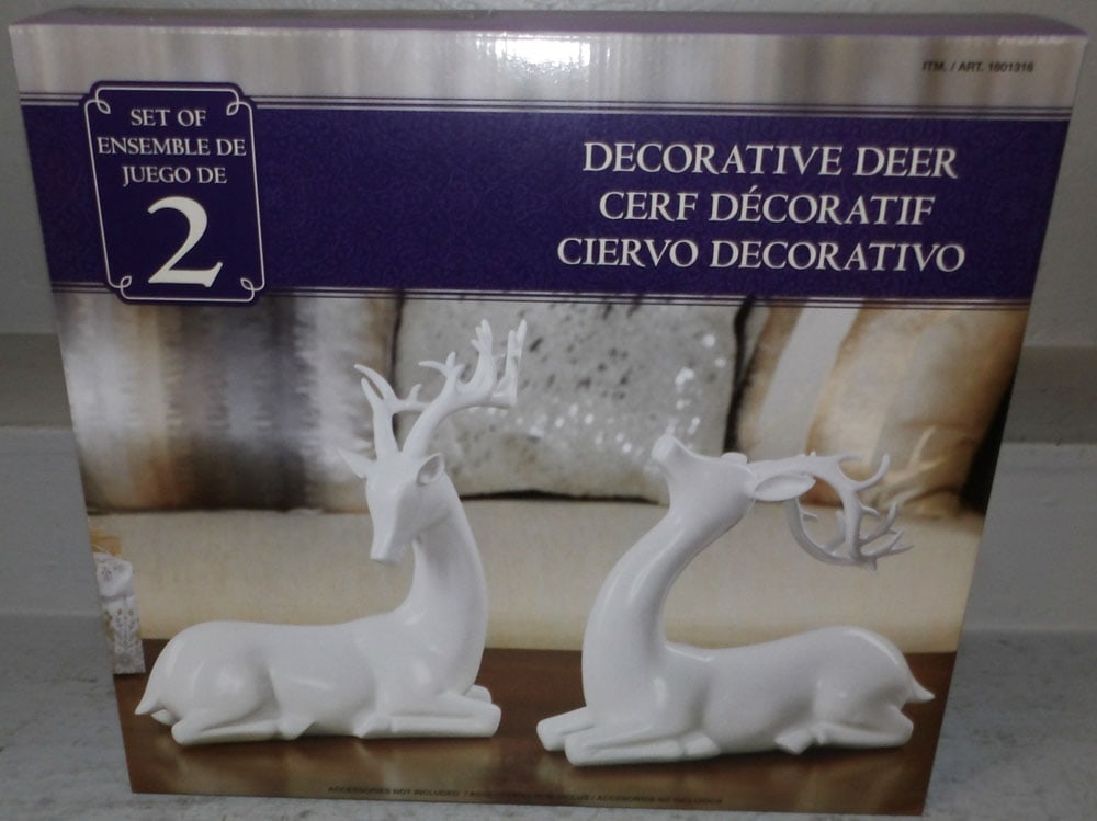 Two Porcelain Decorative Deer in Box: Two Porcelain Decorative Deer in Box. Box: 16 1/4" H 18" W 7 1/2" D "ALL DESCRIPTIONS AND ANY CONDITION STATEMENT GIVEN BY LANGSTON AUCTION GALLERY ARE STRICTLY OPINIONS AND LANGSTON'S SHALL HAVE NO