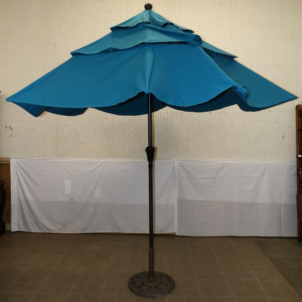 Large Umbrella with Painted Cast Iron Base: Large Umbrella with Painted Cast Iron Base . 107 1/2" H "ALL DESCRIPTIONS AND ANY CONDITION STATEMENT GIVEN BY LANGSTON AUCTION GALLERY ARE STRICTLY OPINIONS AND LANGSTON'S SHALL HAVE NO