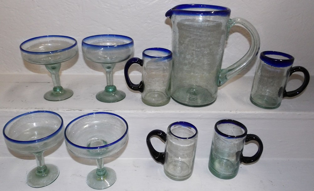 Lot of Margarita Glasses & Lemonade Set: Lot of Margarita Glasses & Lemonade Set . Up to 9 1/4" H 9" W "ALL DESCRIPTIONS AND ANY CONDITION STATEMENT GIVEN BY LANGSTON AUCTION GALLERY ARE STRICTLY OPINIONS AND LANGSTON'S SHALL HAVE NO