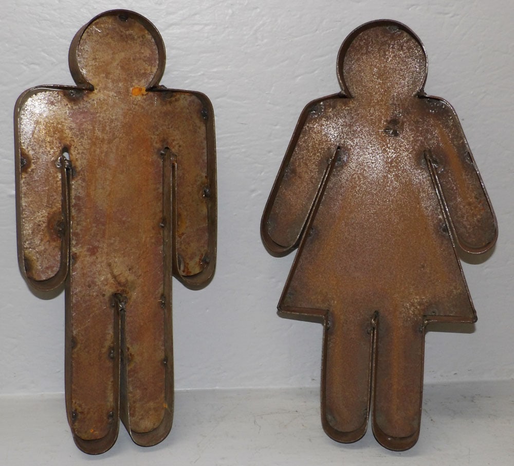 Two Folk Art Galvanized Metal Man & Woman Bathroom Signs: Two Folk Art Galvanized Metal Man & Woman Bathroom Signs. Up to 18 3/4" L 10" W "ALL DESCRIPTIONS AND ANY CONDITION STATEMENT GIVEN BY LANGSTON AUCTION GALLERY ARE STRICTLY OPINIONS AND LANGSTON'S