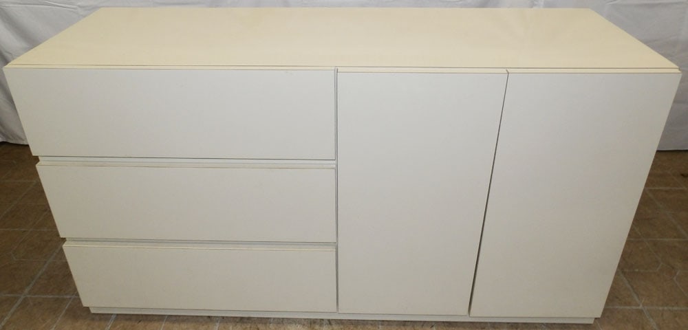 Modern Three Drawer Two Door Cabinet: Modern Three Drawer Two Door Cabinet . 30 1/4" H 56 1/4" W 19 3/4" D "ALL DESCRIPTIONS AND ANY CONDITION STATEMENT GIVEN BY LANGSTON AUCTION GALLERY ARE STRICTLY OPINIONS AND LANGSTON'S SHALL HAVE NO