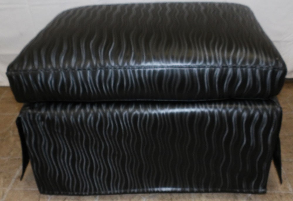 Vinyl Upholstered Ottoman: Vinyl Upholstered Ottoman. 18" H 28" W 20 1/2" D "ALL DESCRIPTIONS AND ANY CONDITION STATEMENT GIVEN BY LANGSTON AUCTION GALLERY ARE STRICTLY OPINIONS AND LANGSTON'S SHALL HAVE NO RESPONSIBILITY FOR