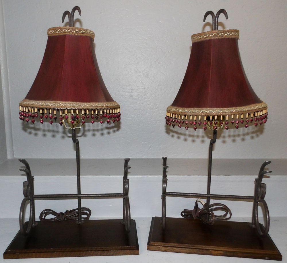 Pair of Cherry & Metal Lamps: Pair of Cherry & Metal Lamps . 25 1/4" H 14" W 7" D "ALL DESCRIPTIONS AND ANY CONDITION STATEMENT GIVEN BY LANGSTON AUCTION GALLERY ARE STRICTLY OPINIONS AND LANGSTON'S SHALL HAVE NO RESPONSIBILITY