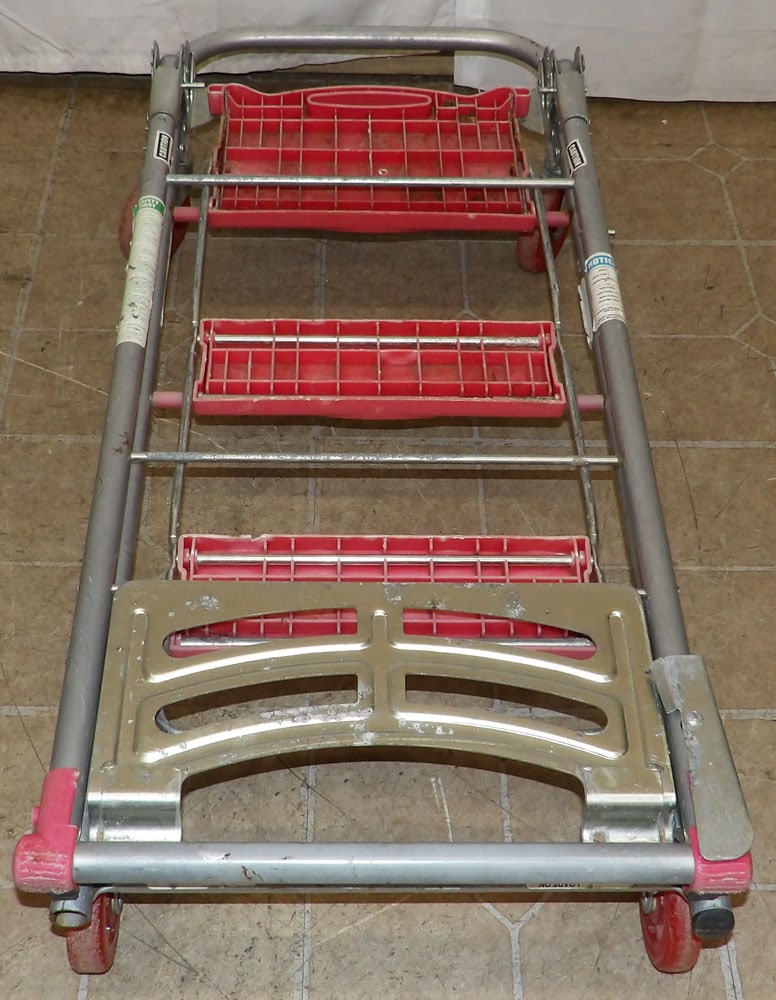 Folding Utility Hand Truck by Total Trolley: Folding Utility Hand Truck by Total Trolley. 42" x 17 1/2" "ALL DESCRIPTIONS AND ANY CONDITION STATEMENT GIVEN BY LANGSTON AUCTION GALLERY ARE STRICTLY OPINIONS AND LANGSTON'S SHALL HAVE NO