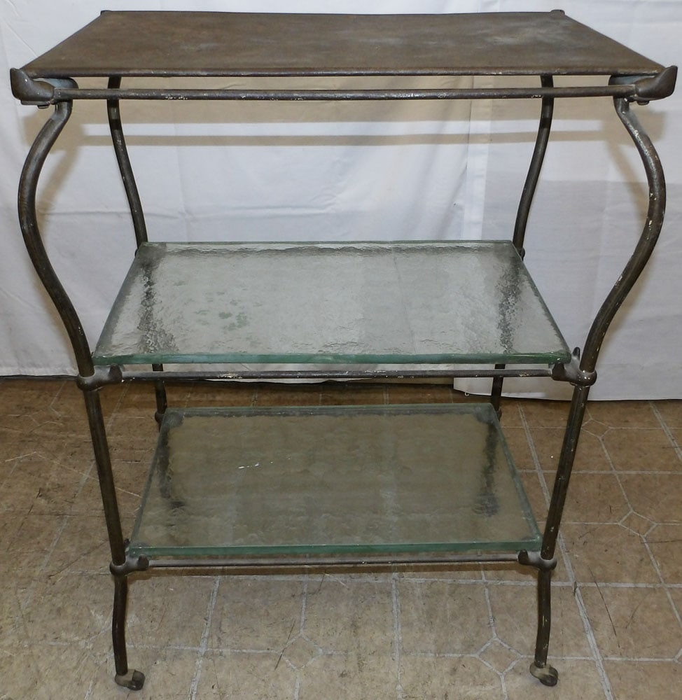 Metal & Glass Three Tier Dumbwaiter: Metal & Glass Three Tier Dumbwaiter . 34 1/2" H 25" W 16 3/4" D "ALL DESCRIPTIONS AND ANY CONDITION STATEMENT GIVEN BY LANGSTON AUCTION GALLERY ARE STRICTLY OPINIONS AND LANGSTON'S SHALL HAVE NO