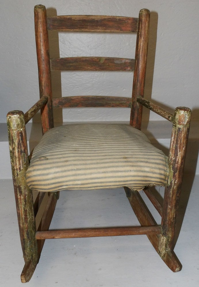 Antique Oak Child's Rocker: Antique Oak Child's Rocker . 23" H 13 3/4" W 17 1/2" D "ALL DESCRIPTIONS AND ANY CONDITION STATEMENT GIVEN BY LANGSTON AUCTION GALLERY ARE STRICTLY OPINIONS AND LANGSTON'S SHALL HAVE NO