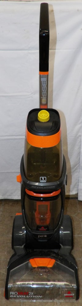 Bissel Carpet Cleaner: Bissel Carpet Cleaner . 43" H 10" W "ALL DESCRIPTIONS AND ANY CONDITION STATEMENT GIVEN BY LANGSTON AUCTION GALLERY ARE STRICTLY OPINIONS AND LANGSTON'S SHALL HAVE NO RESPONSIBILITY FOR ERRORS OR