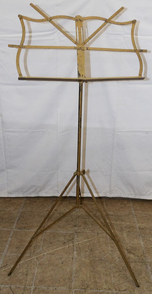 Painted Metal Music Sheet Stand: Painted Metal Music Sheet Stand . 37 3/4" H 22 3/4" Dia. "ALL DESCRIPTIONS AND ANY CONDITION STATEMENT GIVEN BY LANGSTON AUCTION GALLERY ARE STRICTLY OPINIONS AND LANGSTON'S SHALL HAVE NO