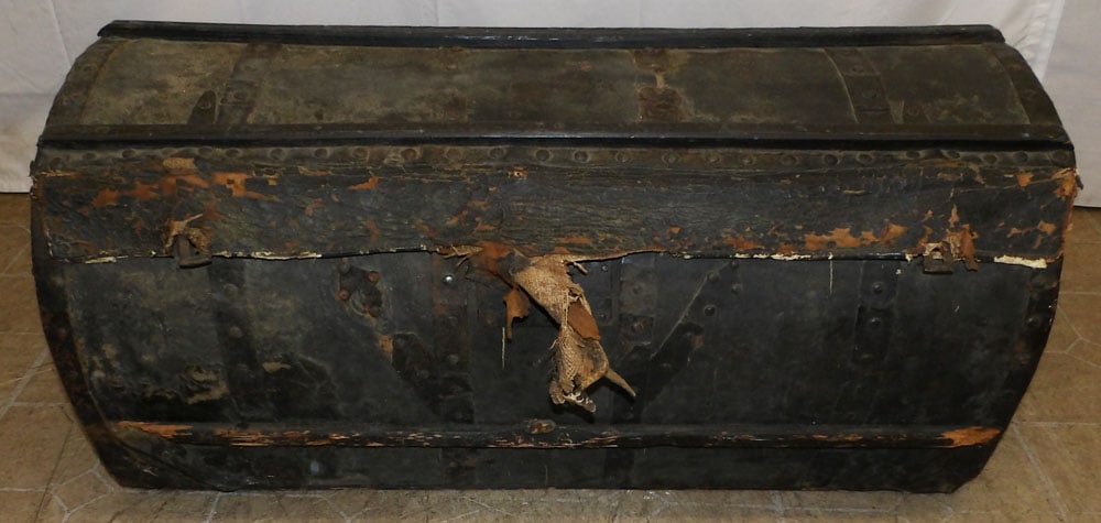Antique Leather Bound Trunk: Antique Leather Bound Trunk. 17 3/4" H 37" W 20 1/2" D "ALL DESCRIPTIONS AND ANY CONDITION STATEMENT GIVEN BY LANGSTON AUCTION GALLERY ARE STRICTLY OPINIONS AND LANGSTON'S SHALL HAVE NO