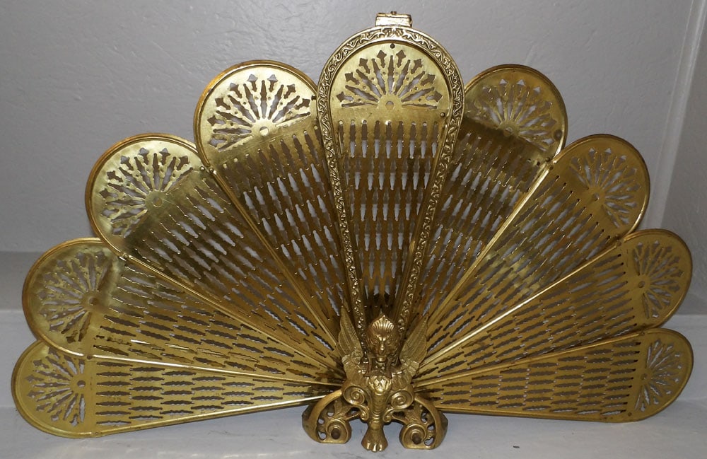 Brass Fireplace Screen: Brass Fireplace Screen . 22" H 7" W "ALL DESCRIPTIONS AND ANY CONDITION STATEMENT GIVEN BY LANGSTON AUCTION GALLERY ARE STRICTLY OPINIONS AND LANGSTON'S SHALL HAVE NO RESPONSIBILITY FOR ERRORS OR