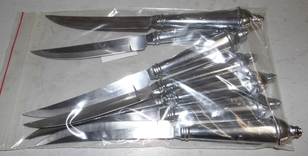 Lot of Towle Copenhagen Stainless Steel Steak Knives: Lot of Towle Copenhagen Stainless Steel Steak Knives . Up to 9" L "ALL DESCRIPTIONS AND ANY CONDITION STATEMENT GIVEN BY LANGSTON AUCTION GALLERY ARE STRICTLY OPINIONS AND LANGSTON'S SHALL HAVE NO