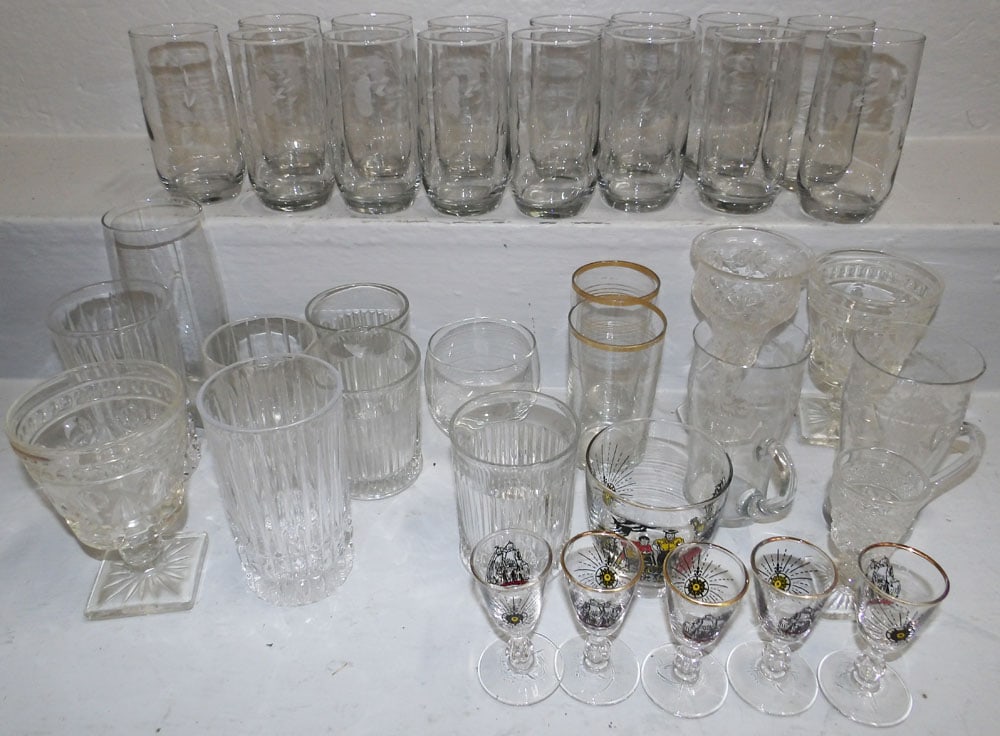 Lot of Glasses: Lot of Glasses . Up to 7" H 3" Dia. "ALL DESCRIPTIONS AND ANY CONDITION STATEMENT GIVEN BY LANGSTON AUCTION GALLERY ARE STRICTLY OPINIONS AND LANGSTON'S SHALL HAVE NO RESPONSIBILITY FOR ERRORS OR