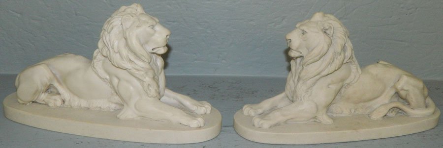 Pair of French parian lion bookends.: Pair of French parian lion bookends. 9 1/4" long x 5" tall.