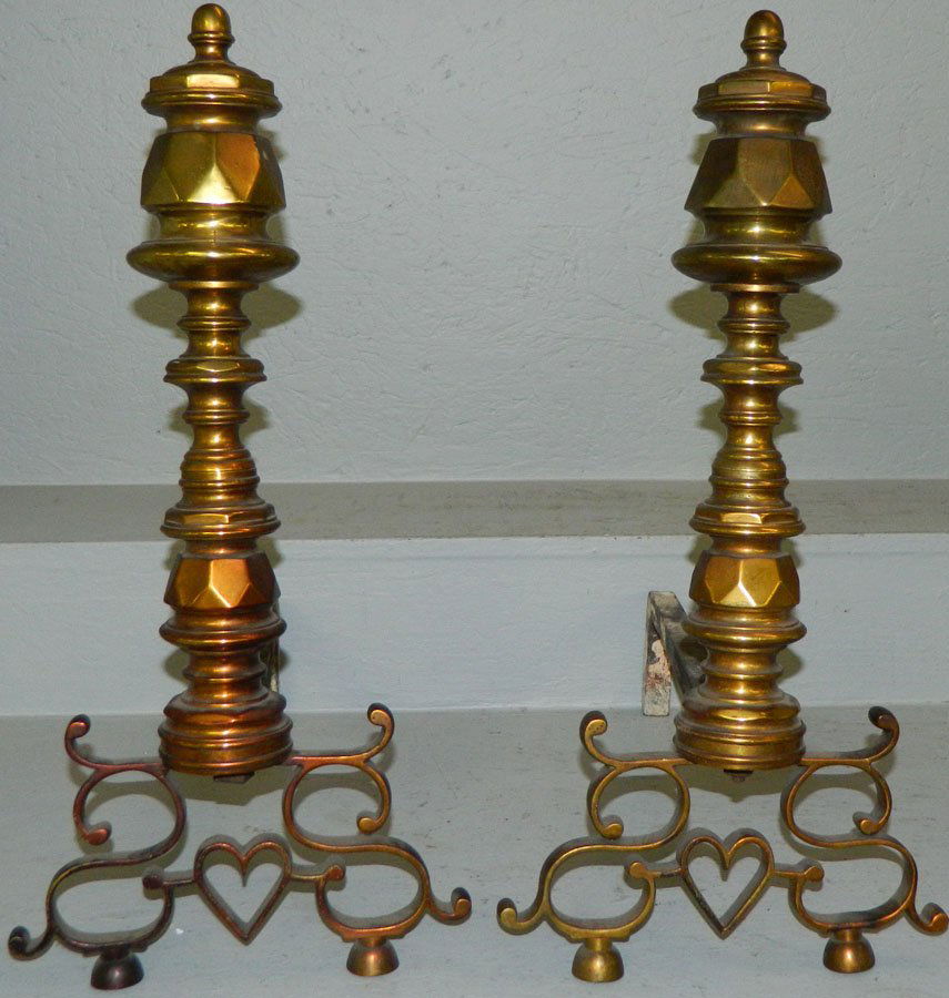 Pair of brass andirons.: Pair of brass andirons. 22" tall.