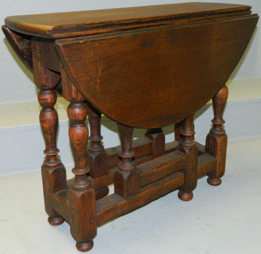19th C English oak Jacobean style tea table.: 19th Century English oak Jacobean style tea table. 25" open x 23 1/2" deep x 19 1/2" tall.