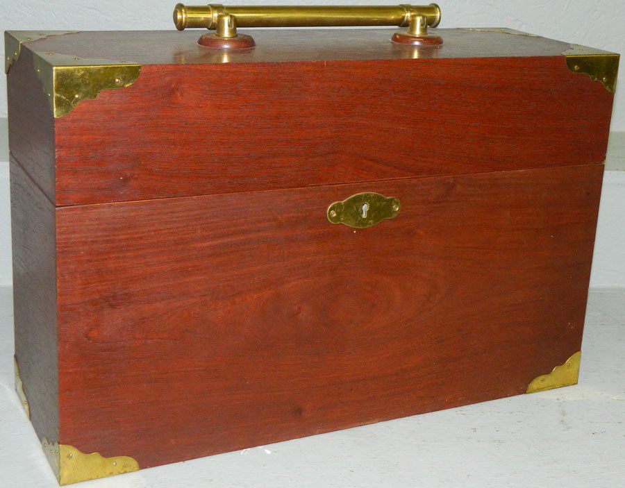 Four bottle cellarette box from the Pope estate.: Four bottle cellarette box from the Pope estate. 20" wide x 7" deep x 13" tall.