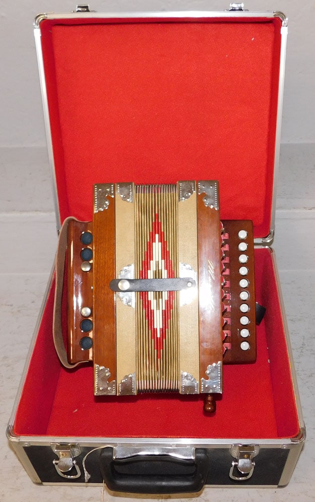 Vintage Morelli Accordion in Case: Vintage Morelli Accordion in Case. Case: 13 1/2" H 14" W 8 1/4" D ALL DESCRIPTIONS AND ANY CONDITION STATEMENT GIVEN BY LANGSTON AUCTION GALLERY ARE STRICTLY OPINIONS AND LANGSTON'S SHALL HAVE NO RESP