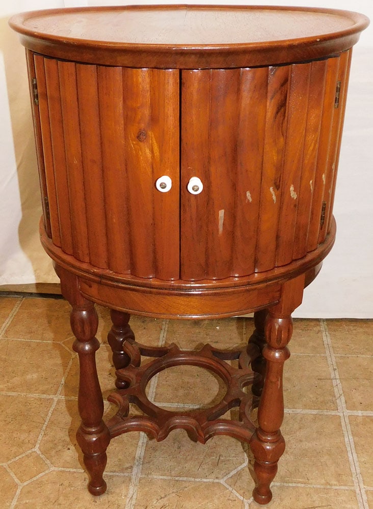 Antique Round Walnut Two Door Stand: Antique Round Walnut Two Door Stand. 23" H 14 3/4" Dia. ALL DESCRIPTIONS AND ANY CONDITION STATEMENT GIVEN BY LANGSTON AUCTION GALLERY ARE STRICTLY OPINIONS AND LANGSTON'S SHALL HAVE NO RESPONSIBILITY