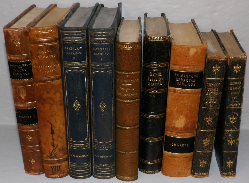 Nine Antique Leather Bound Books: Nine Antique Leather Bound Books . 7 1/2" x 5 1/4" ALL DESCRIPTIONS AND ANY CONDITION STATEMENT GIVEN BY LANGSTON AUCTION GALLERY ARE STRICTLY OPINIONS AND LANGSTON'S SHALL HAVE NO RESPONSIBILITY FOR 