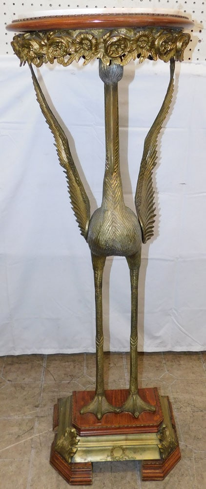 Brass Heron Form Stand with Marble Top: Brass Heron Form Stand with Marble Top. 46 3/4" H 16" Dia. ALL DESCRIPTIONS AND ANY CONDITION STATEMENT GIVEN BY LANGSTON AUCTION GALLERY ARE STRICTLY OPINIONS AND LANGSTON'S SHALL HAVE NO