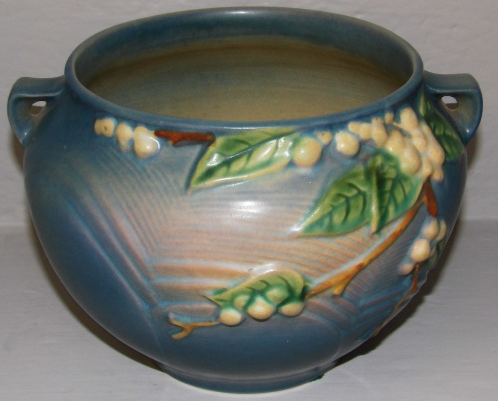 Roseville Snowberry Jardiniere: Roseville Snowberry Jardiniere . 6 1/4" H 9" Dia. ALL DESCRIPTIONS AND ANY CONDITION STATEMENT GIVEN BY LANGSTON AUCTION GALLERY ARE STRICTLY OPINIONS AND LANGSTON'S SHALL HAVE NO RESPONSIBILITY FOR