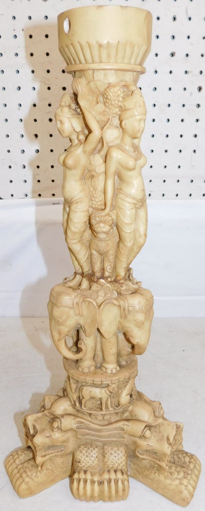Carved Oriental Resin Element: Carved Oriental Resin Element. 19 1/4" H 9" Dia. ALL DESCRIPTIONS AND ANY CONDITION STATEMENT GIVEN BY LANGSTON AUCTION GALLERY ARE STRICTLY OPINIONS AND LANGSTON'S SHALL HAVE NO RESPONSIBILITY FOR ER
