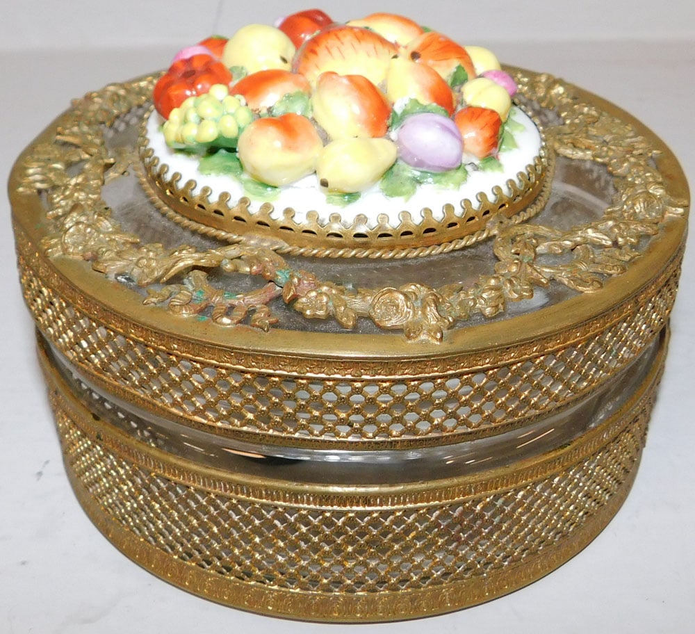 Crystal Brass Bound & Painted Porcelain Dresser Box: Crystal Brass Bound & Painted Porcelain Dresser Box . 3 1/4" H 5 1/2" Dia. ALL DESCRIPTIONS AND ANY CONDITION STATEMENT GIVEN BY LANGSTON AUCTION GALLERY ARE STRICTLY OPINIONS AND LANGSTON'S SHALL