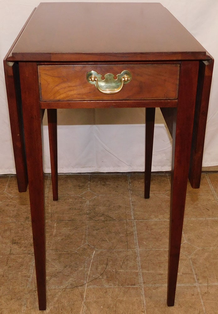 Cherry Drop Leaf Table with One Drawer by Henkel Harris: Cherry Drop Leaf Table with One Drawer by Henkel Harris . 26 1/4" H 15 1/4" W 23 1/4" D ALL DESCRIPTIONS AND ANY CONDITION STATEMENT GIVEN BY LANGSTON AUCTION GALLERY ARE STRICTLY OPINIONS AND LANGSTO