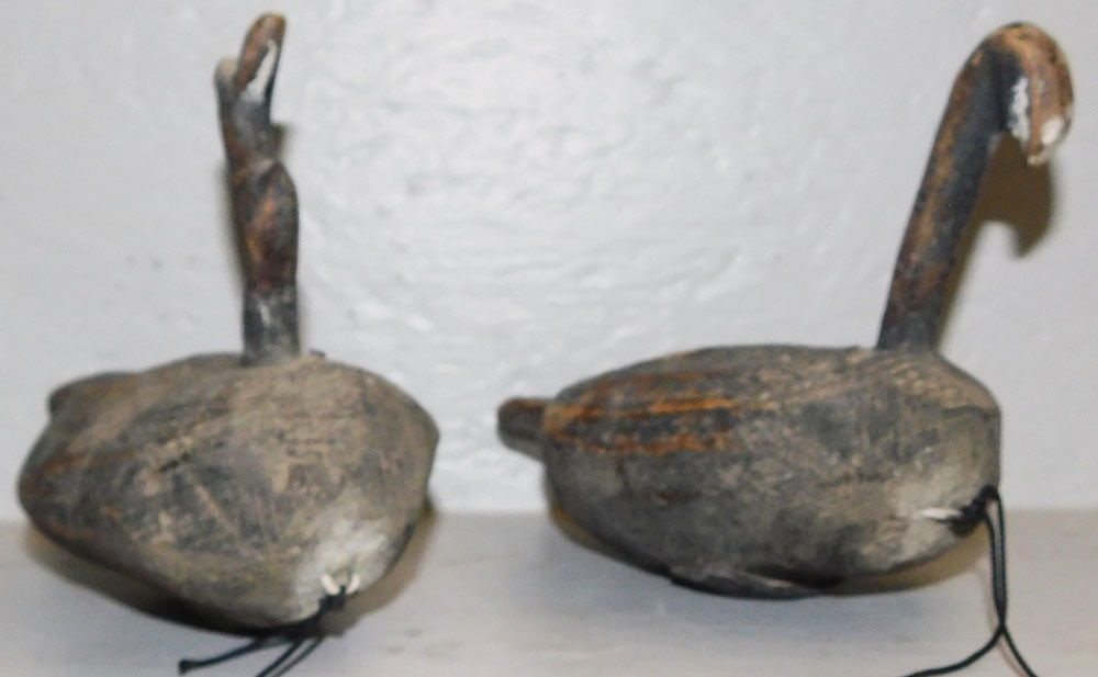 Two Primitive Carved Wood Root Head Duck Decoys: Two Primitive Carved Wood Root Head Duck Decoys. 5 3/4" H 8 1/4" L ALL DESCRIPTIONS AND ANY CONDITION STATEMENT GIVEN BY LANGSTON AUCTION GALLERY ARE STRICTLY OPINIONS AND LANGSTON'S SHALL HAVE NO RES