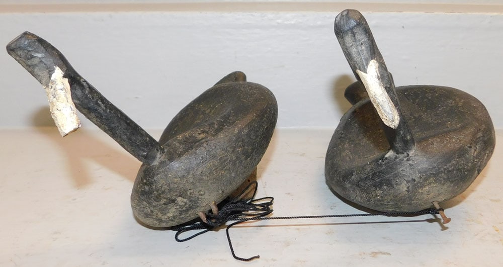 Two Primitive Carved Wood Root Head Duck Decoys: Two Primitive Carved Wood Root Head Duck Decoys . 8 1/2" H 11 1/2" L ALL DESCRIPTIONS AND ANY CONDITION STATEMENT GIVEN BY LANGSTON AUCTION GALLERY ARE STRICTLY OPINIONS AND LANGSTON'S SHALL HAVE NO R