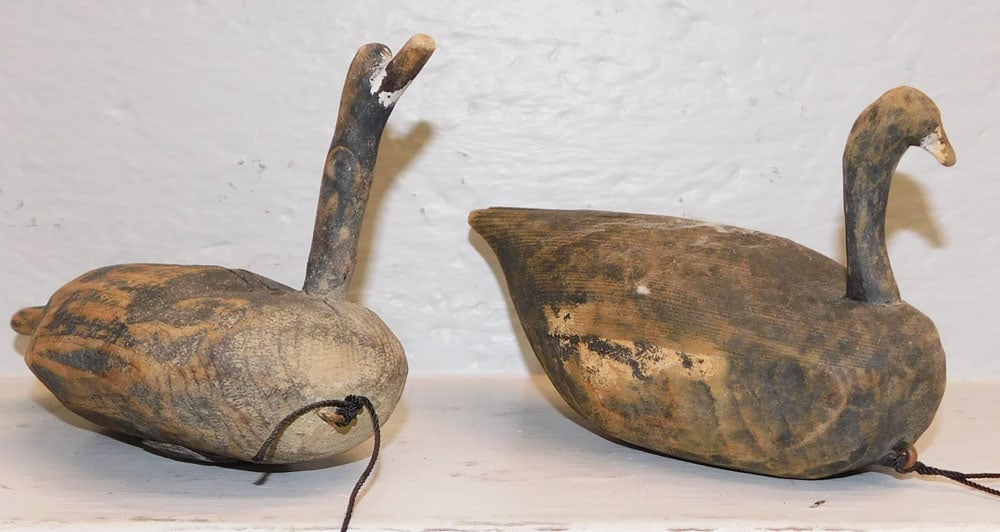 Two Primitive Carved Wood Root Head Duck Decoys: Two Primitive Carved Wood Root Head Duck Decoys. 5" H 12 1/2" L ALL DESCRIPTIONS AND ANY CONDITION STATEMENT GIVEN BY LANGSTON AUCTION GALLERY ARE STRICTLY OPINIONS AND LANGSTON'S SHALL HAVE NO RESPON